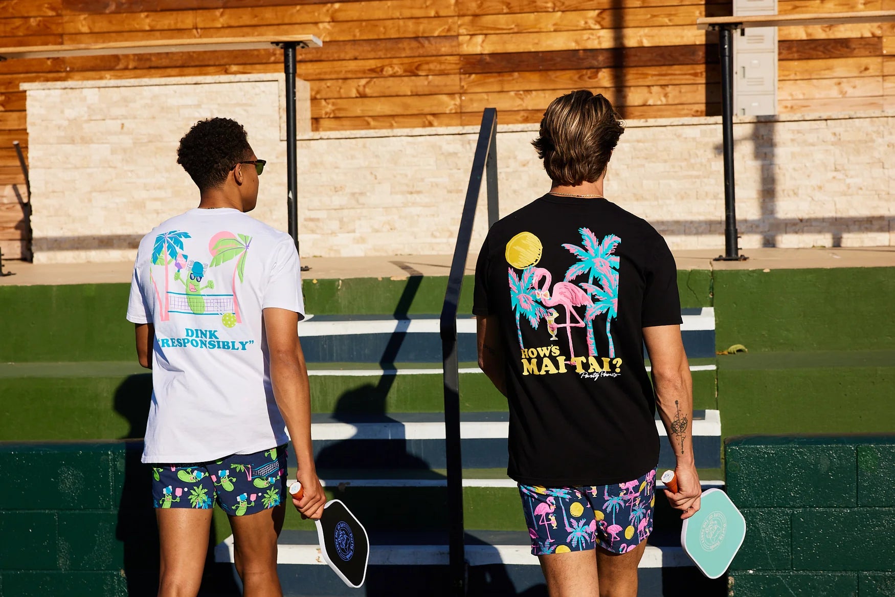Two men playing pickleball