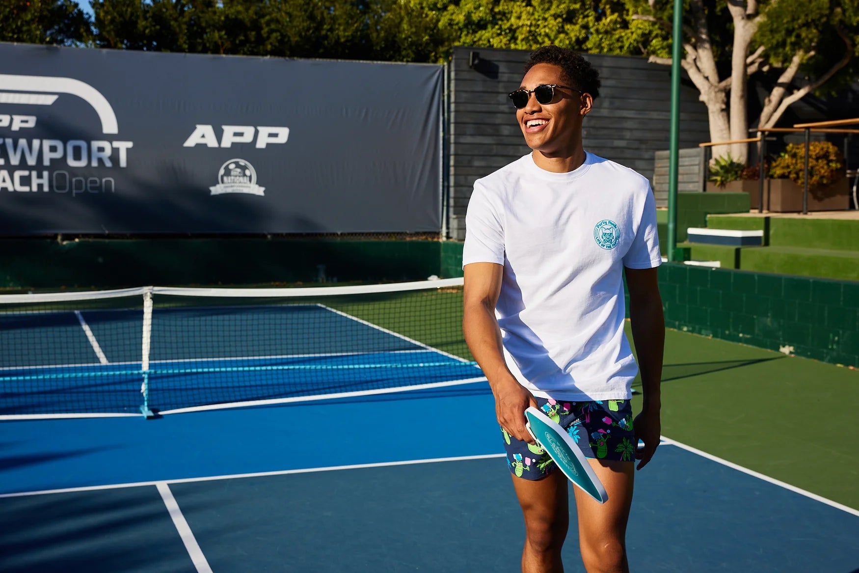 A man at a pickleball court
