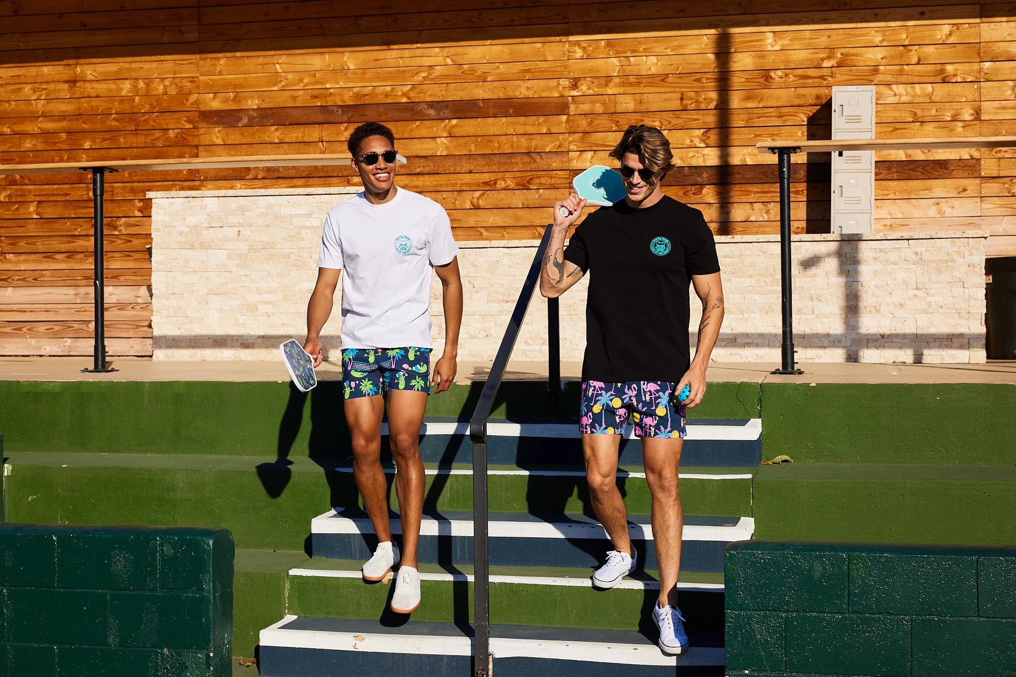 Two men at a pickleball court