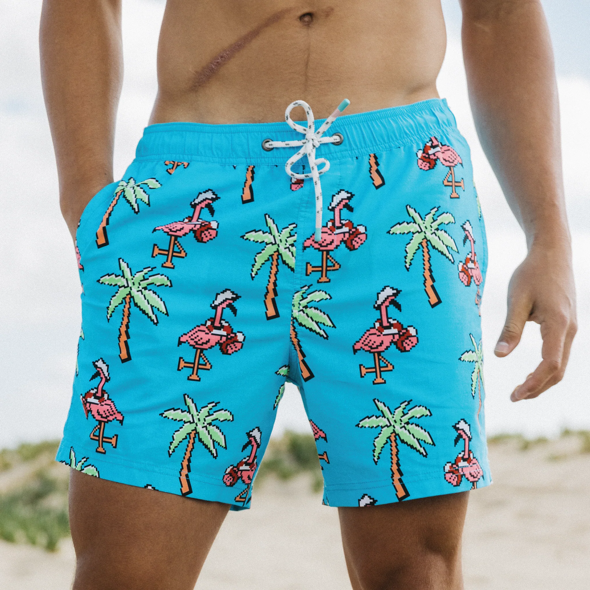 A guy wearing the Pixel Mingo Party Starter Short - Blue