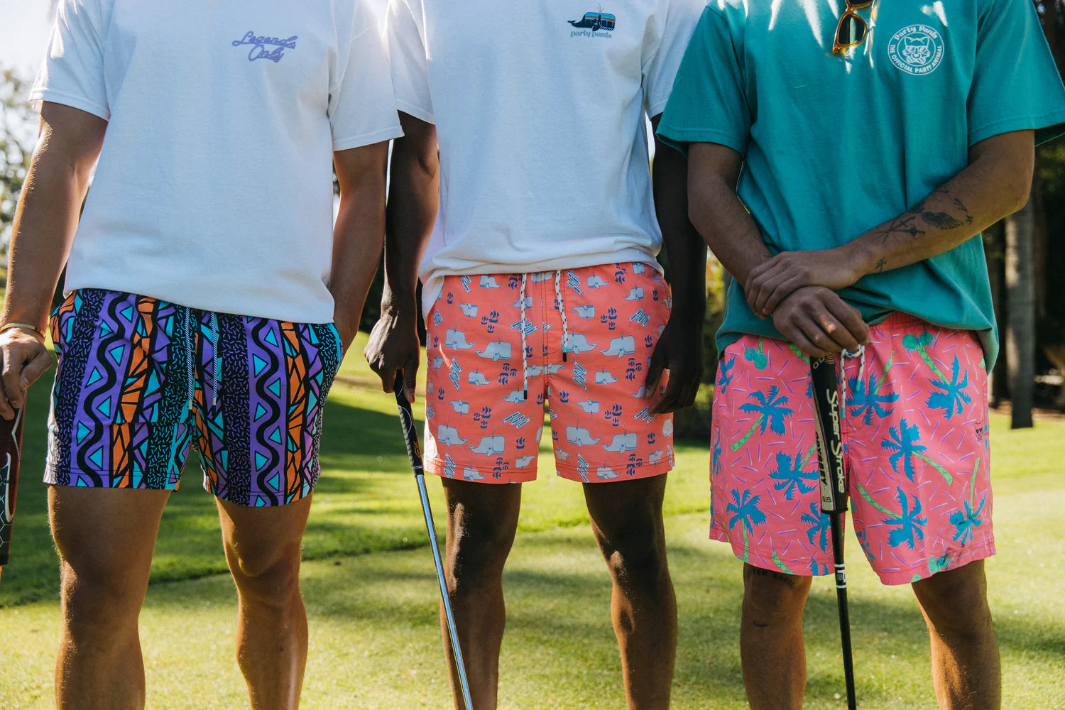 Three guys wearing Party Pants stretch swim shorts
