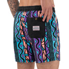 A rear view of a guy wearing the Maui Wowie Party Starter Short
